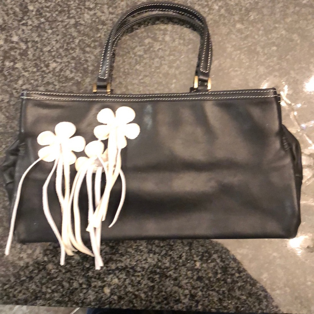 Kenneth Cole clutch with flower